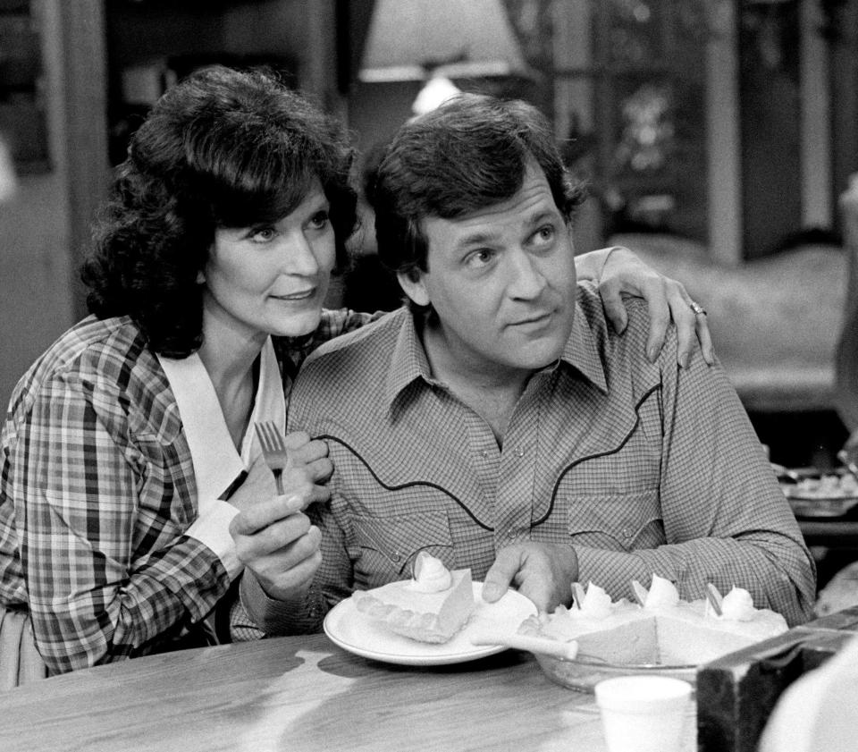 Loretta Lynn, left, is working with songwriter Steve Pippin during the taping of her new Crisco commercial at the Tennessee Performing Arts Center in Nashville March 25, 1983. Lynn, a gal that knows how to make her own pies and cakes, use Crisco at home.