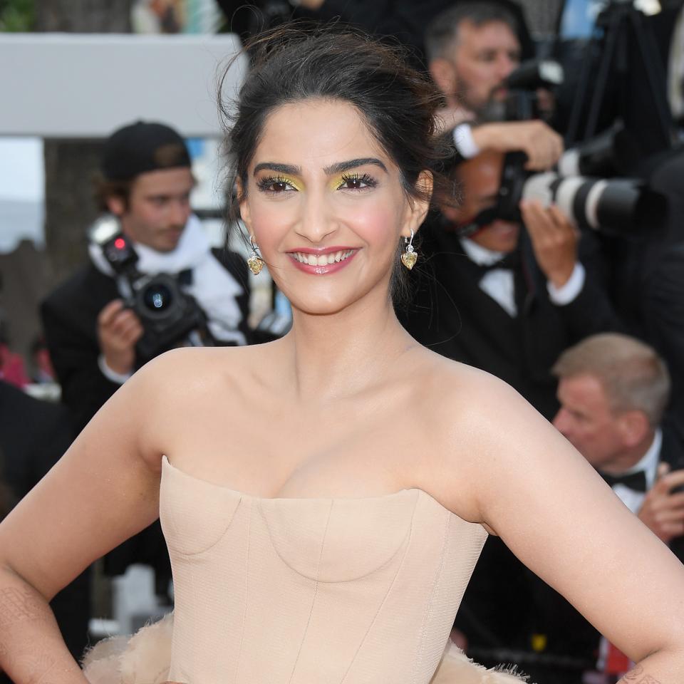 Sonam Kapoor stepped into the red carpet with striking henna-painted hands at the Cannes Film Festival.