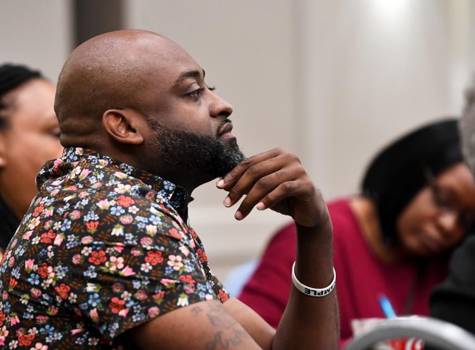 Jazmin Mitchell, a city councilman in York, listens to one of the speakers during a session about the Alabama Healthy Homes project Wednesday at Hotel Capstone in Tuscaloosa.