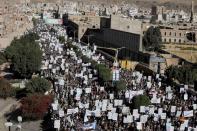 Houthi supporters rally against the United States' designation of Houthis as a foreign terrorist organisation, in Sanaa,