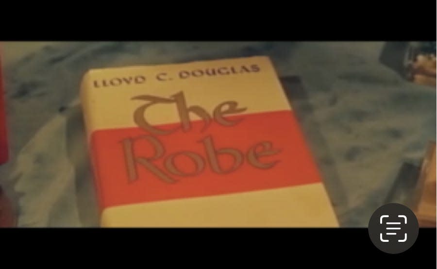 Author and minister Lloyd C. Douglas wrote "The Robe," about Roman soldiers gambling over possession of Christ's garment at the base of his cross, after the suggestion of a Canton woman, Hazel McCann.