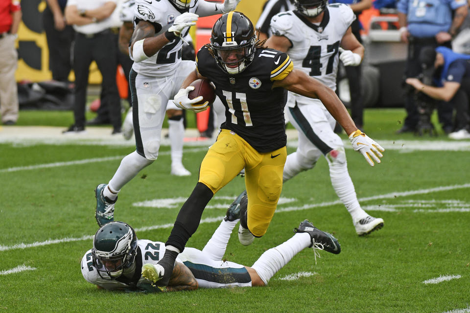 Pittsburgh Steelers wide receiver Chase Claypool (11) gets past Philadelphia Eagles safety Marcus Epps (22) after taking a pass from quarterback Ben Roethlisberger for a touchdown during the first half of an NFL football game in Pittsburgh, Sunday, Oct. 11, 2020. (AP Photo/Don Wright)