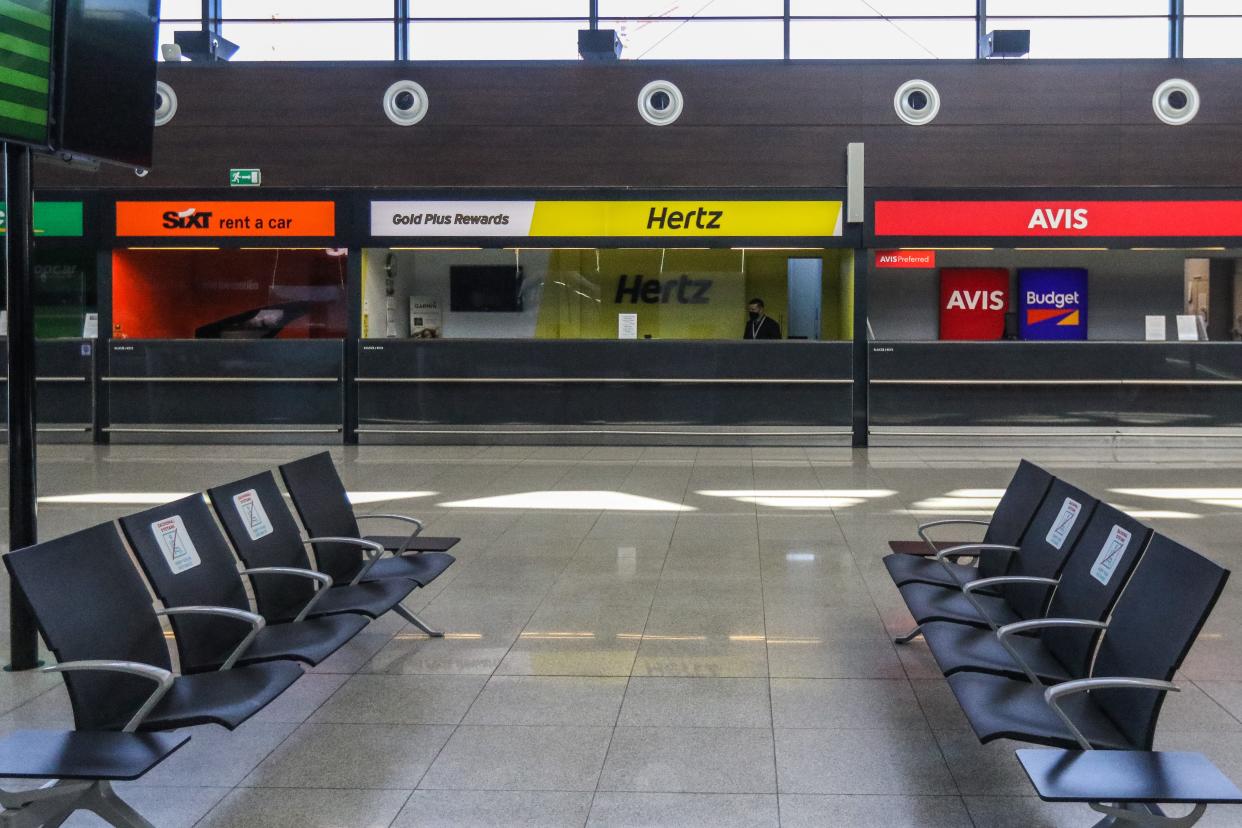 Rental car counters airport Hertz Avis Sixt