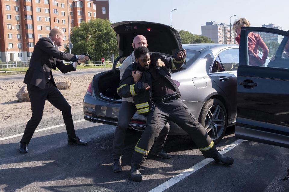 John David Washington and Elizabeth Debicki in the car sequence in "Tenet."