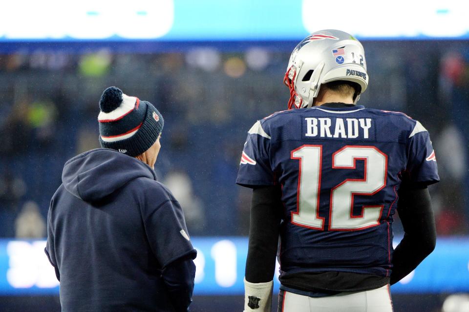 FOXBOROUGH, MASSACHUSETTS - NOVEMBER 24: Head coach Bill Belichick of the New England Patriots talks with Tom Brady #12 before the game against the Dallas Cowboys at Gillette Stadium on November 24, 2019 in Foxborough, Massachusetts. (Photo by Kathryn Riley/Getty Images)