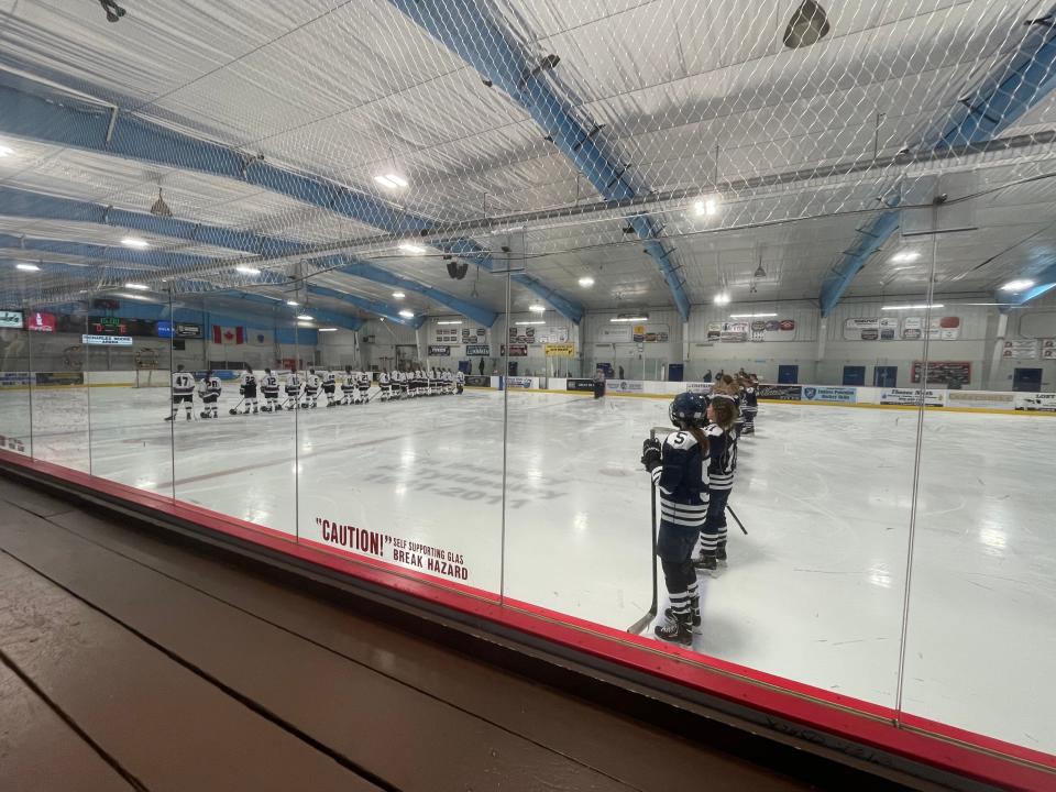 The Cape Cod Furies and Nantucket Whalers line up for the National Anthem.