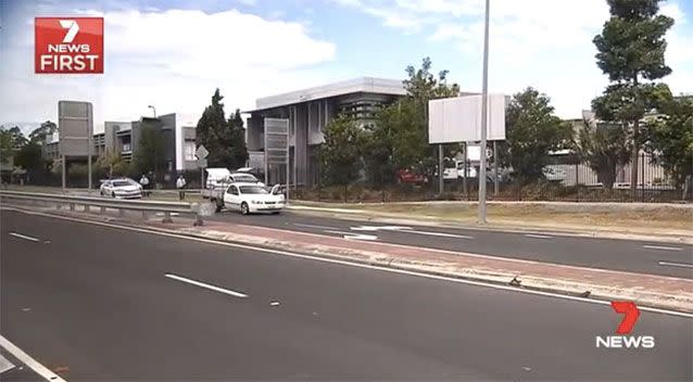 The man's ute remained stopped on the Logan street. Picture: 7 News