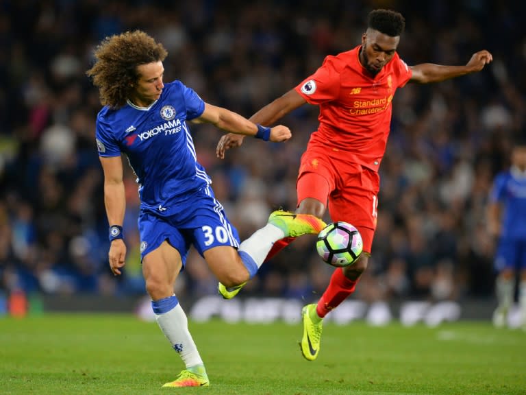 Chelsea's Brazilian defender David Luiz (L) vies with Liverpool's English striker Daniel Sturridge during the English Premier League football match