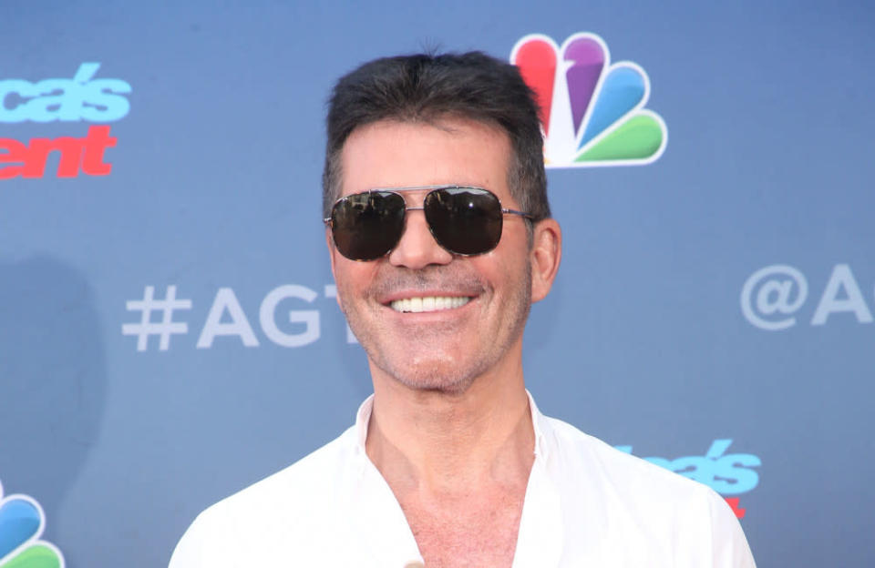 Simon Cowell is reportedly engaged to partner Lauren Silverman credit:Bang Showbiz