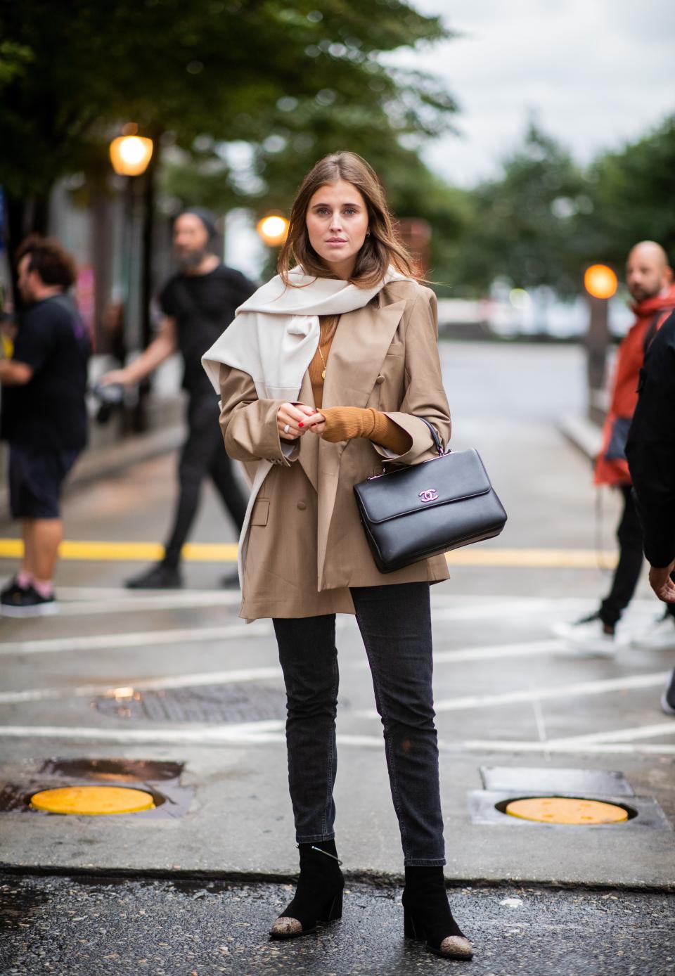 A throw-on-and-go styling trick that's also a solution for lugging around extra layers.