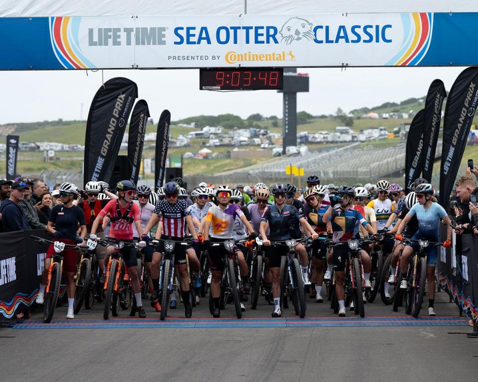 a group of people riding bikes