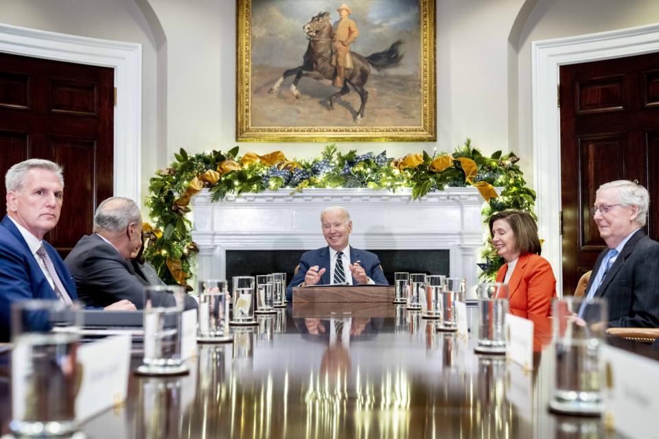 CORRECTS YEAR TO 2022 - President Joe Biden, center, speaks at the top of a meeting with congressional leaders to discuss legislative priorities for the rest of the year, Tuesday, Nov. 29, 2022, in the Roosevelt Room of the White House in Washington. From left are House Minority Leader Kevin McCarthy of Calif., Senate Majority Leader Chuck Schumer, of N.Y., Biden, House Speaker Nancy Pelosi of Calif., and Senate Minority Leader Mitch McConnell of Ky. (AP Photo/Andrew Harnik)