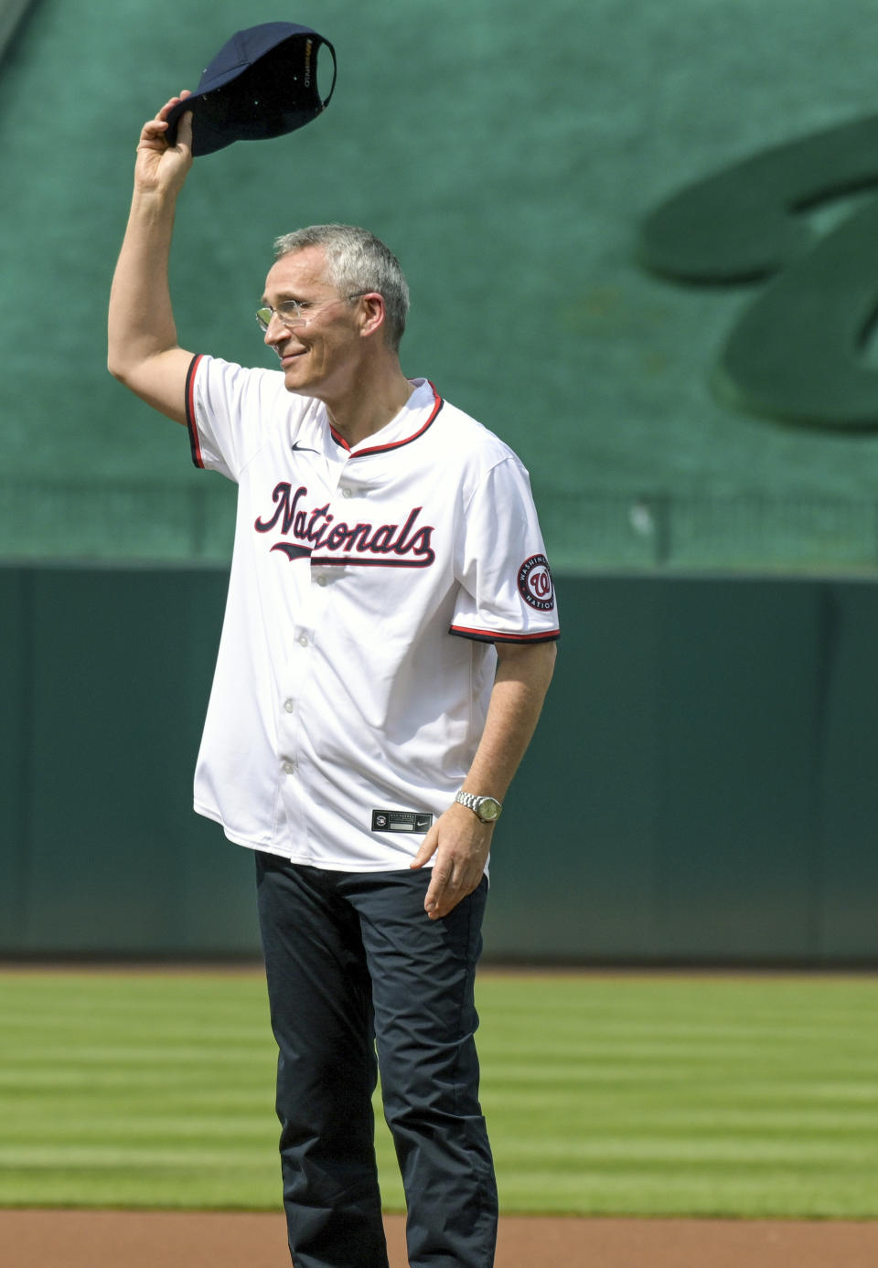 WASHINGTON, DC - July 08: Jens Stoltenberg, Secretary General of the United Nations prepares to throw out the first pitch prior to the St. Louis Cardinals versus the Washington Nationals on July 8, 2024 at Nationals Park in Washington, D.C. (Photo by Mark Goldman/Icon Sportswire) (Icon Sportswire via AP Images)