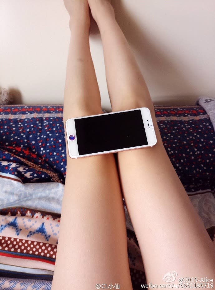 The "iPhone 6 Knees Challenge" Has Women Hiding Their Legs Behind Their Phones