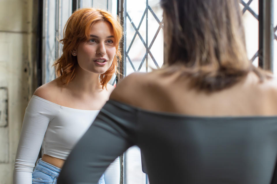 Two women speaking