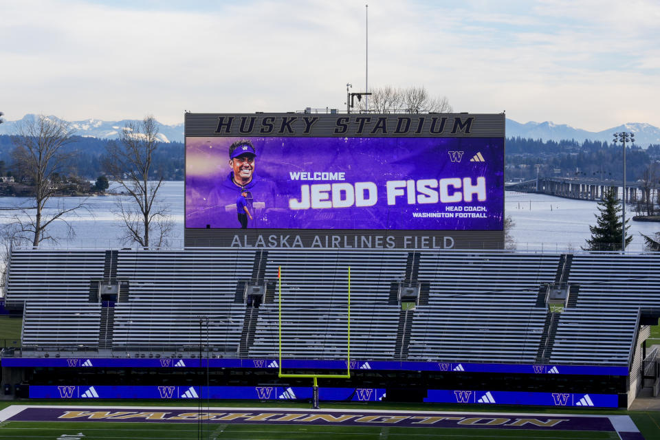 A display board in Husky Stadium shows a welcome message for new Washington head coach Jedd Fisch during an NCAA college football press conference Tuesday, Jan. 16, 2024, in Seattle. (AP Photo/Lindsey Wasson)