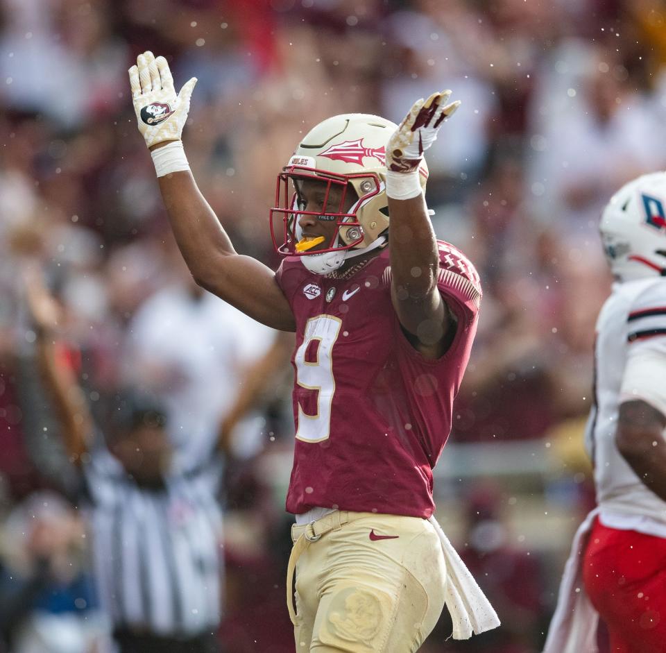 Florida State running back Lawrance Toafili (9) blows kisses to fans. The Florida State Seminoles hosted the Duquesne Dukes at Doak Campbell Stadium on Saturday, Aug. 27, 2022.