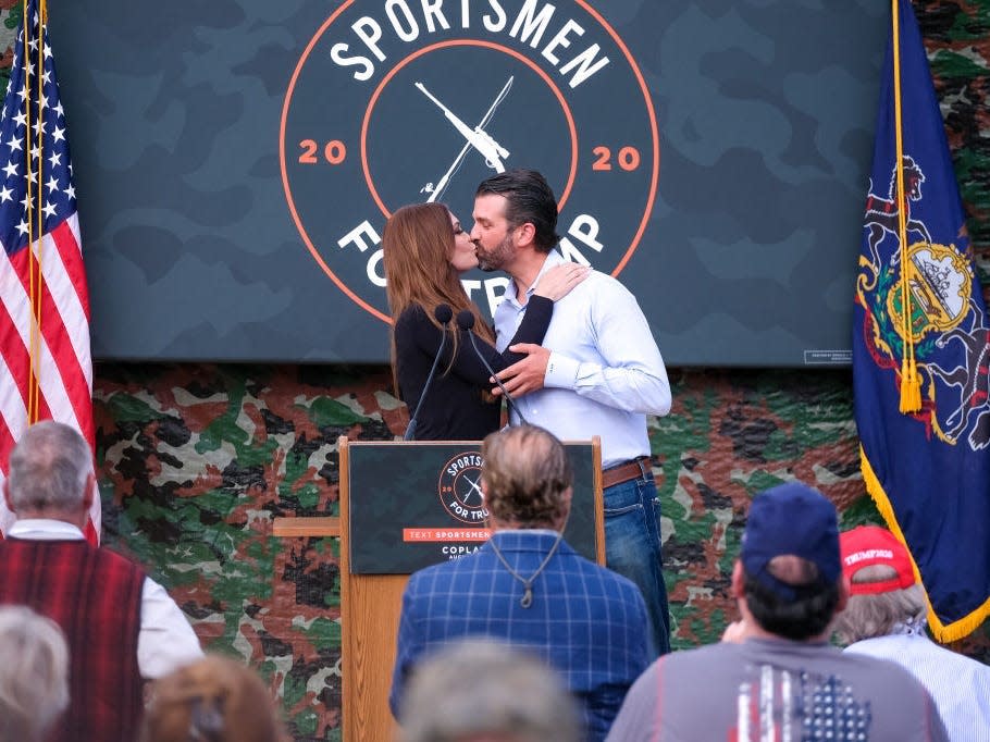 Donald Trump Jr, and Kimberly Guilfoyle kiss during the Sportsmen for Trump launch in August 2020.