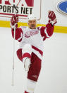 Detroit Red Wings defenseman Nicklas Lidstrom celebrates his team's second goal against the Carolina Hurricanes in the third period of game 2 of the Stanley Cup finals in Detroit, Thursday, June 6, 2002. (AP Photo/Paul Sancya)