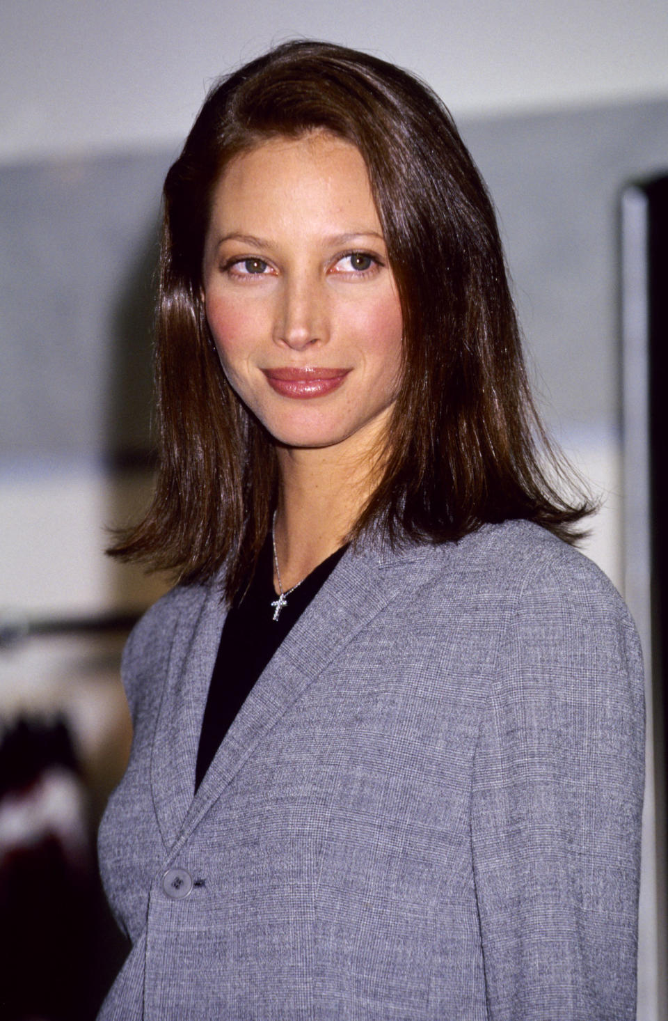 <p>Christy Turlington is the epitome of the 90s at this Calvin Klein advert launch, wearing plain grey and black</p>