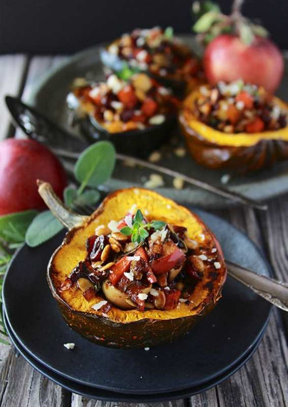 <p>Cooking with Ruthie</p><p>This dish stars three fall produce superstars, and is filled with all the aromas and flavors of autumn. </p><p><strong>Get the recipe: <a href="https://cookingwithruthie.com/2021/09/07/apple-and-sweet-potato-stuffed-acorn-squash/" rel="nofollow noopener" target="_blank" data-ylk="slk:Apple and Sweet Potato Stuffed Acorn Squash;elm:context_link;itc:0;sec:content-canvas" class="link ">Apple and Sweet Potato Stuffed Acorn Squash</a></strong></p>
