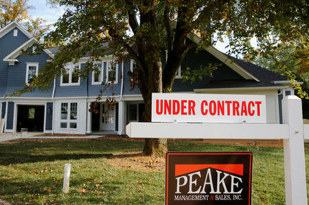 FILE PHOTO: A real estate sign advertising a home "Under Contract" is pictured in Vienna, Virginia, outside of Washington, October 20, 2014. REUTERS/Larry Downing/File Photo