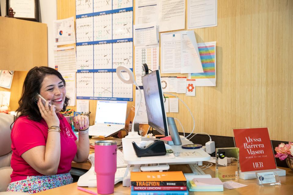 Alyssa Barrera Mason, the executive director of Downtown Management District, answers a phone call in her office on May 5, 2023, in Corpus Christi, Texas. 