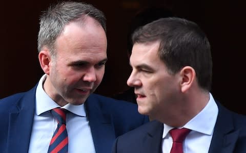 Number 10 Chief of Staff Gavin Barwell (L) and Oliver "Olly" Robbins, former Prime Minister Theresa May's Europe Adviser, leaving 10 Downing Street in March  - Credit: Ben Stansall/AFP