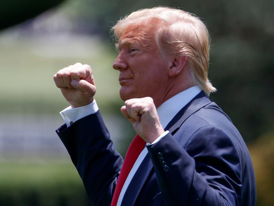 President Donald Trump gestures as he walks to Marine One across the South Lawn of the White House in Washington, Wednesday, June 26, 2019