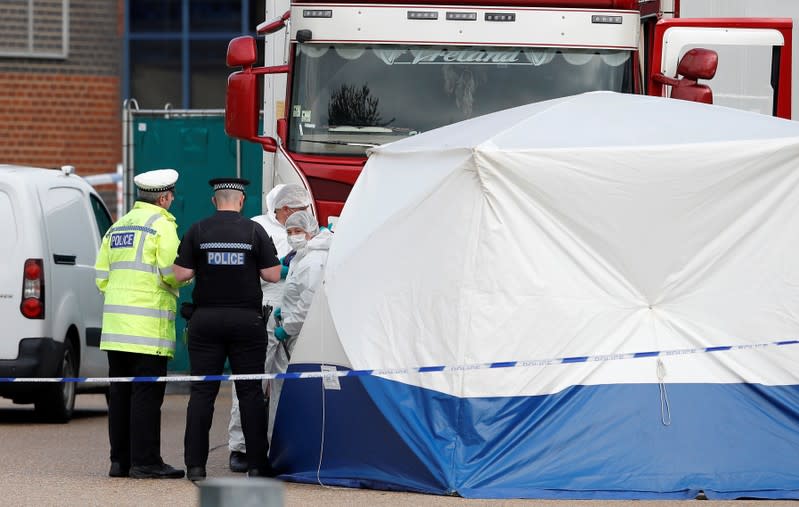 The scene where bodies were discovered in a lorry container, in Grays, Essex