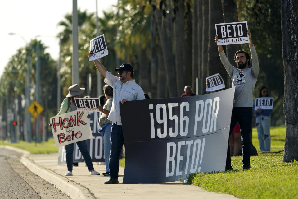 Supporters of Texas Democratic gubernatorial candidate Beto O'Rourke cheer outside the site of his debate with Texas Gov. Greg Abbott, Friday, Sept. 30, 2022, in Edinburg, Texas. As Democrats embark on another October blitz in pursuit of flipping America's biggest red state, Republicans are taking a swing of their own: Making a play for the mostly Hispanic southern border on Nov. 8 after years of writing off the region that is overwhelmingly controlled by Democrats. (AP Photo/Eric Gay)