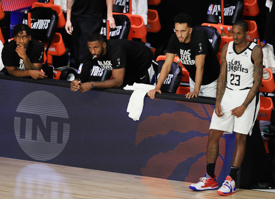 Lou Williams #23 of the LA Clippers and the LA Clippers bench react during the fourth quarter against the Denver Nuggets in Game Five of the Western Conference Second Round