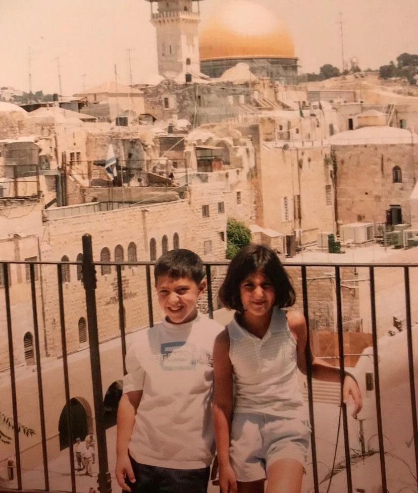 Des Moines Register journalist Andrea Sahouri and her brother, Alex Sahouri, photographed in Jerusalem during a childhood visit to Palestine.