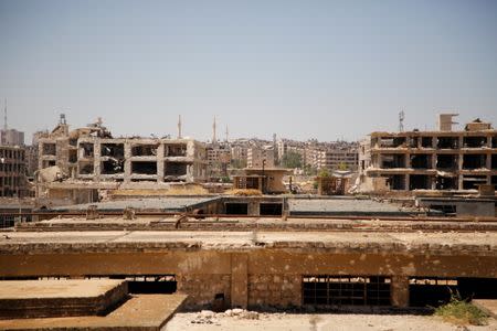 A view of destroyed buildings in Aleppo's Belleramoun Industrial Zone, Syria July 12, 2017. Picture taken July 12, 2017. REUTERS/Omar Sanadiki