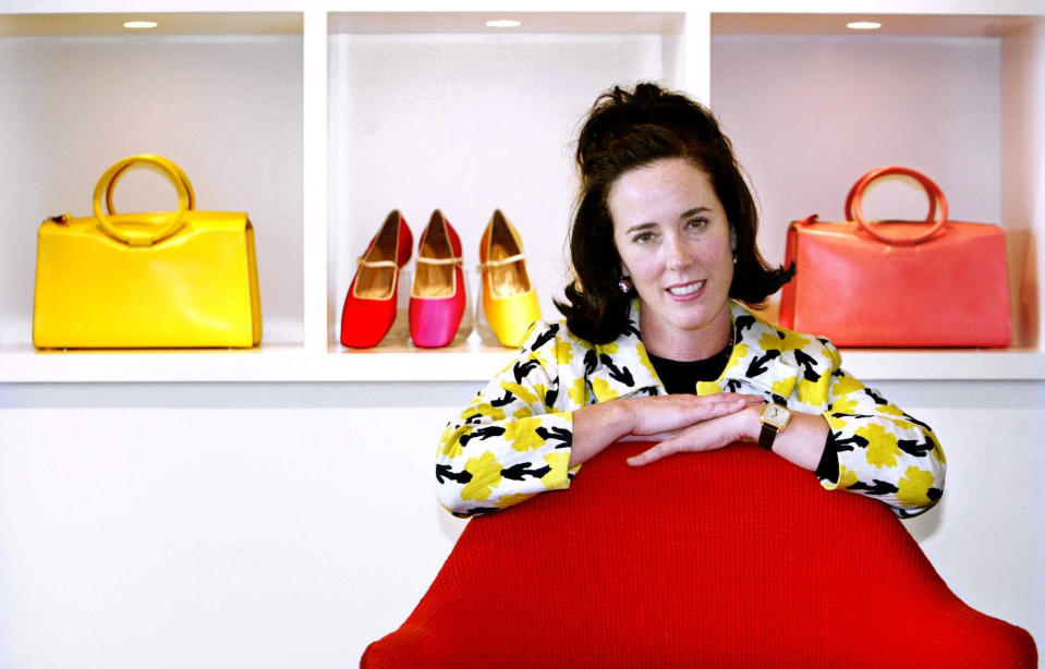 In this May 13, 2004 file photo, designer Kate Spade poses with handbags and shoes from her next collection in New York. Source: AAP