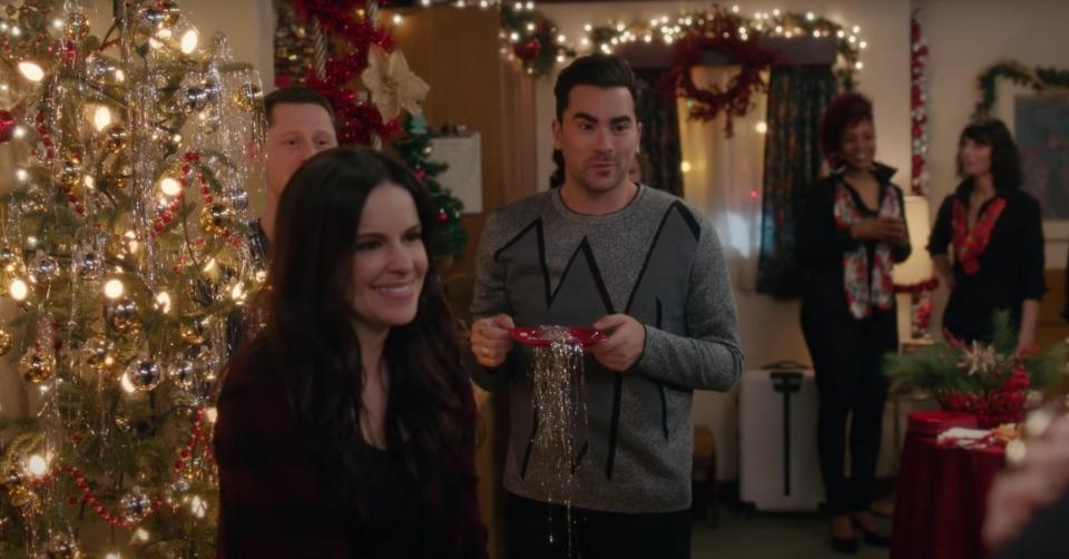 Actors Dan Levy, Emily Hampshire, and Noah Reid in "Schitt's Creek"