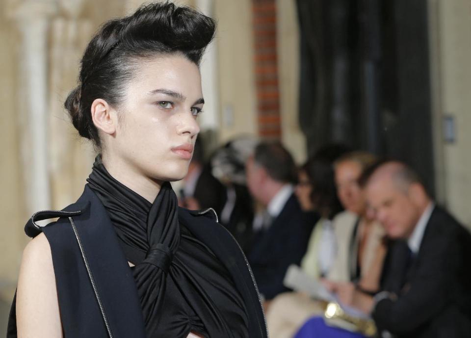 A model wears a creation by fashion designer Bouchra Jarrar during her Women's Fall Winter 2013-2014 haute couture fashion collection presented at Antoine Bourdelle Museum, in Paris Tuesday, July 2, 2013 in Paris. (AP Photo/Jacques Brinon)