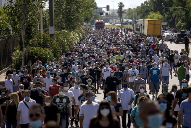 Nissan workers march during a protest (Emilio Morenatti/AP)