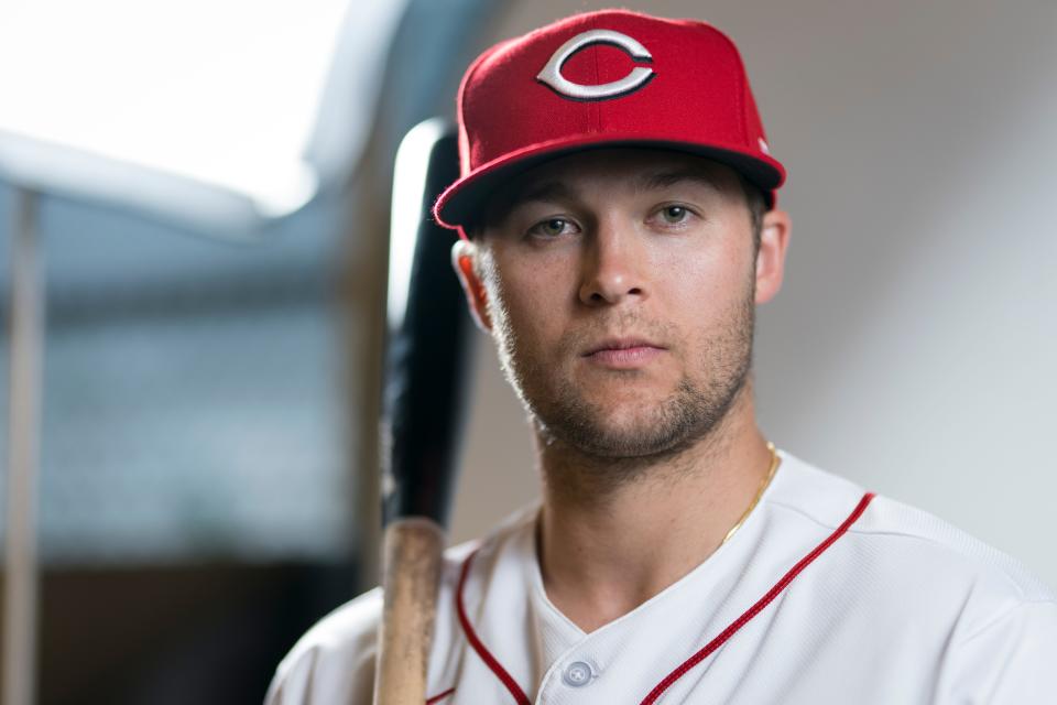 Cincinnati Reds center fielder Nick Senzel (15) poses for the annual picture day photo at the Cincinnati Reds Player Development Complex in Goodyear, Ariz., on Tuesday, Feb. 21, 2023.