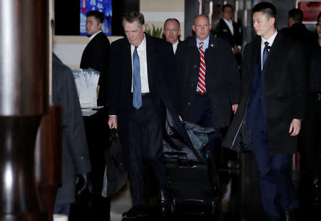 U.S. trade representative Robert Lighthizer, a member of the U.S. trade delegation to China, leaves a hotel with his baggage in Beijing, China February 15, 2019. REUTERS/Jason Lee