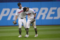 Cleveland Guardians' Tyler Freeman, left, congratulates Will Brennan after the team's baseball game against the Minnesota Twins in Cleveland, Saturday, May 18, 2024. (AP Photo/Phil Long)