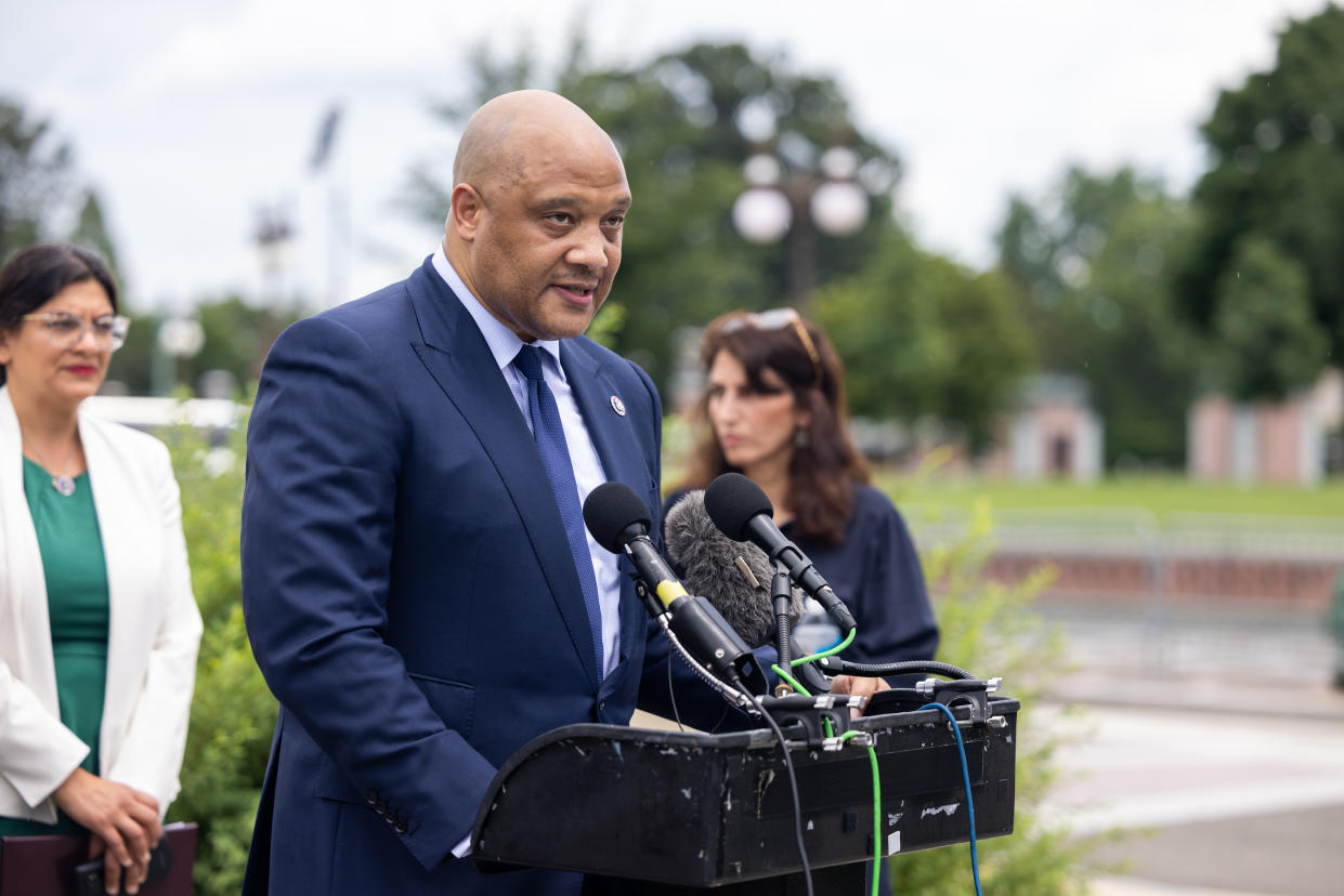 Rep. Andre Carson, D-Ind., speaks outdoors in front of the U.S. Capitol in 2022.