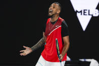 Nick Kyrgios of Australia reacts during his second round match against Daniil Medvedev of Russia at the Australian Open tennis championships in Melbourne, Australia, Thursday, Jan. 20, 2022. (AP Photo/Hamish Blair)