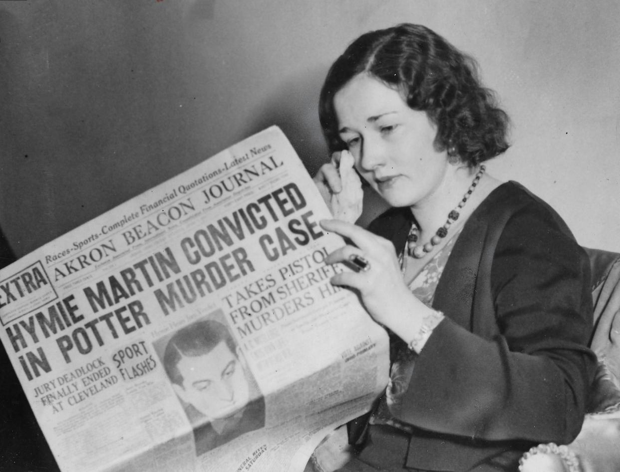 Mary Outland, 27, can't bear to read the Akron Beacon Journal article about her boyfriend April 4, 1931.