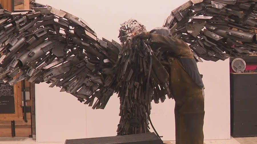 Travis Pond works on his in-progress eagle sculpture that honors the military. April 19, 2024 (KOIN).