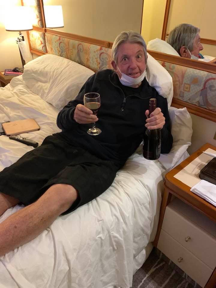 Dave Binskin, from Palm Beach, Queensland, appeared pleased to have the wine as he continues to be quarantined on the Diamond Princess cruise ship.