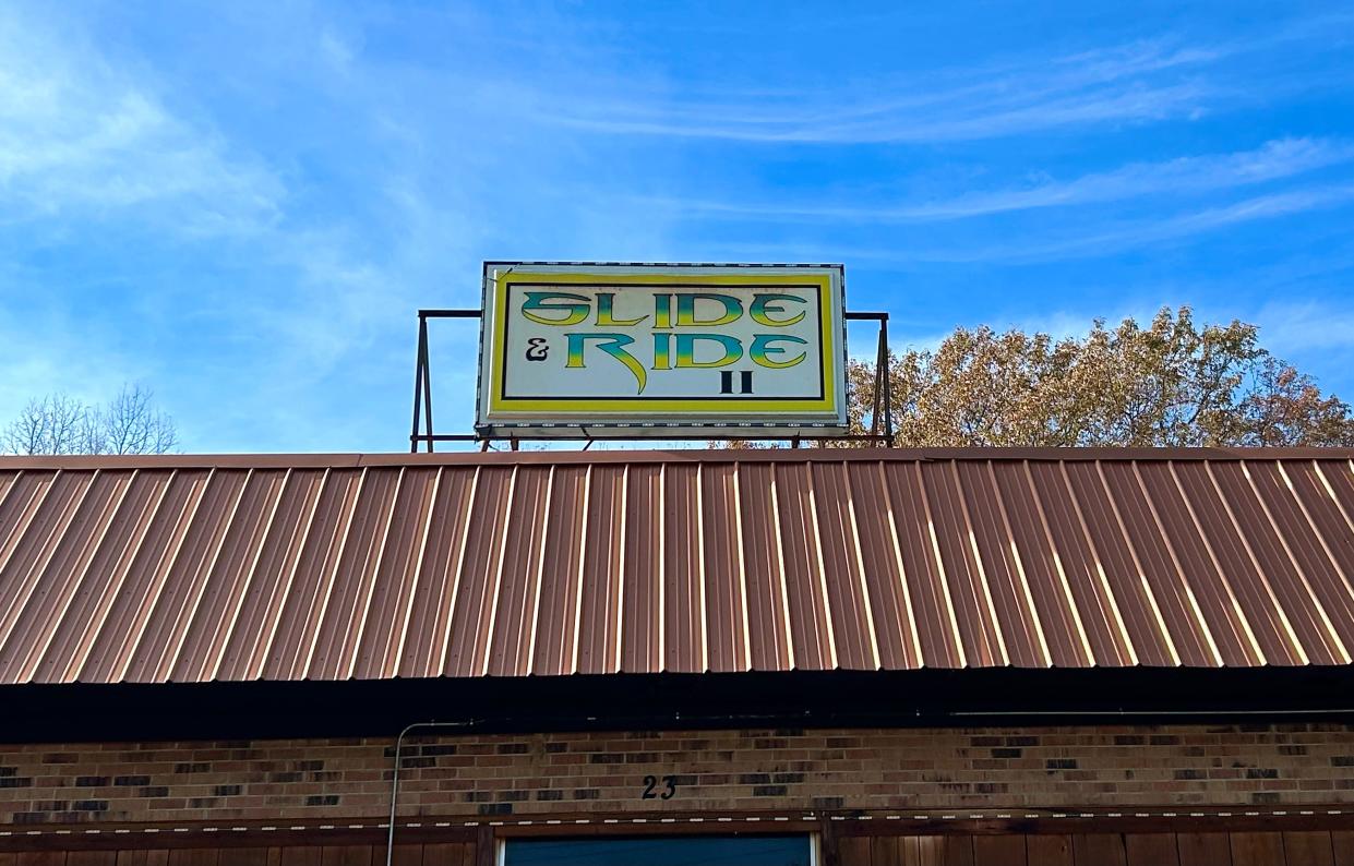 The "Slide and Ride 2" sign sits atop the venue located at 23 Heritage Square in Jackson, Tenn.