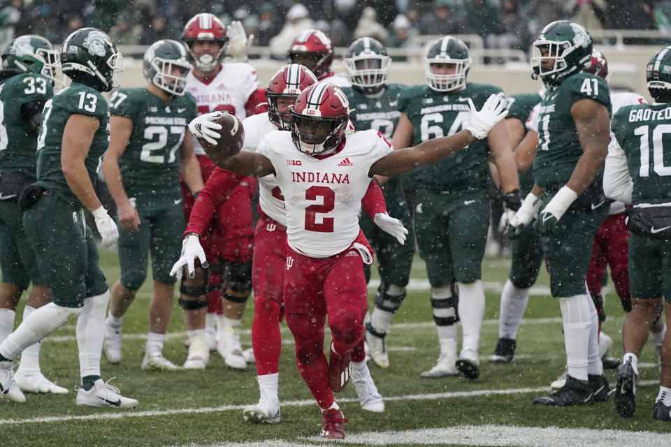 Indiana running back Shaun Shivers (2) reacts after scoring a touchdown during the second overtime of an NCAA college football game against Michigan State, Saturday, Nov. 19, 2022, in East Lansing, Mich. (AP Photo/Carlos Osorio)