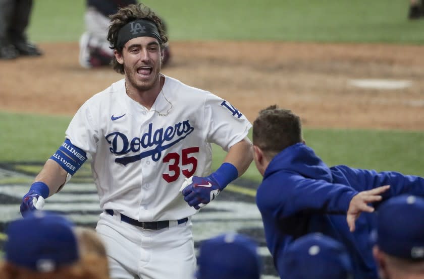 Arlington, Texas, Sunday, October 18, 2020. Los Angeles Dodgers center fielder Cody Bellinger (35) homers.