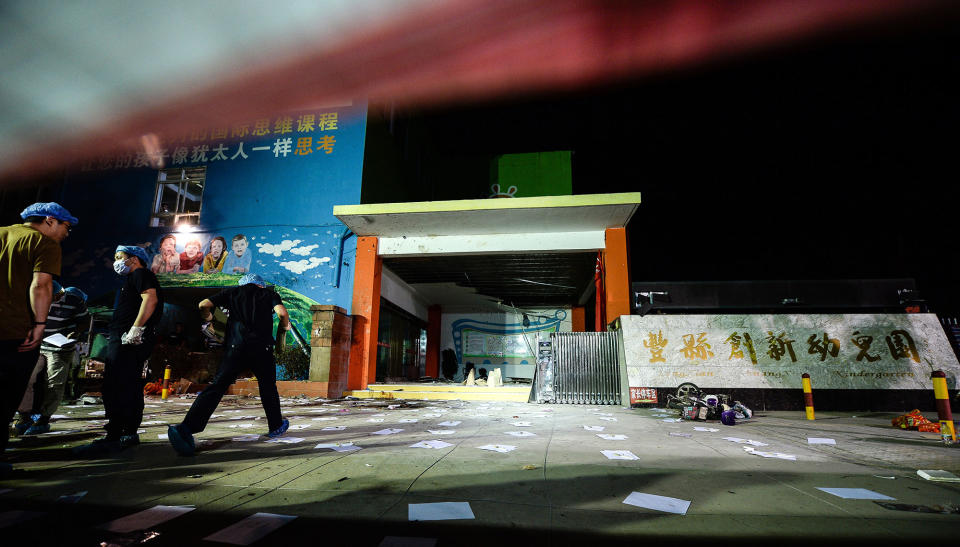 <p>Investigators work early Friday, June 16, 2017, at the scene of an explosion outside a kindergarten in Fengxian County in eastern China’s Jiangsu Province. (Photo: Li Xiang/Xinhua via AP) </p>